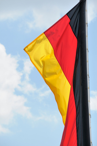 German national flag on the back of a river boat