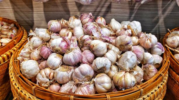 istock Pile of Garlics for sell 1182159813