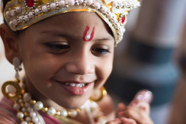 istock cute Little boy dressed up as god Krishna 1182159851