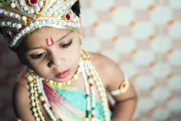istock cute Little boy dressed up as god Krishna 1182159906