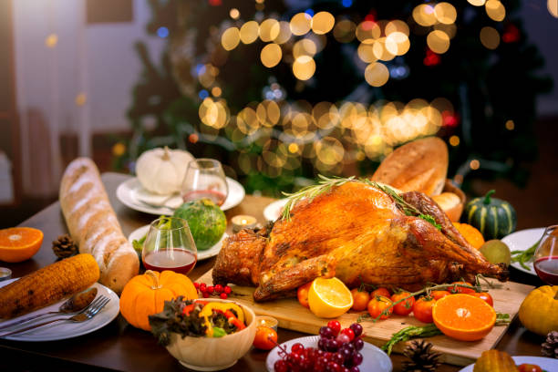 istock Traditional Stuffed Turkey with side dishes corn bread and pumpking pie for holiday dinner Thanksgiving Roast Turkey Dinner 1182162648