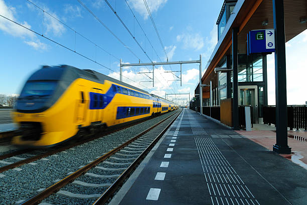 istock Train passing railway station in the Netherlands 118217742
