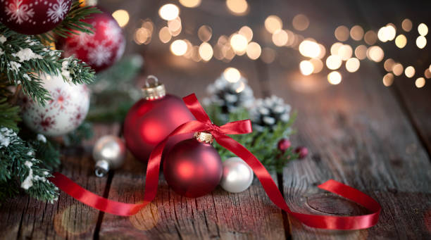 istock Christmas Tree with Red and White Ornaments on a Wood Background 1182177652