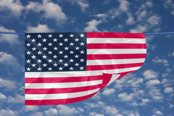 istock American flag in garland in the wind 1182177857