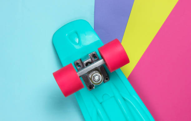 istock Plastic mini cruiser board on colored background. Pastel color trend. Summer fun. Youth minimalistic concept. Top view 1182181852