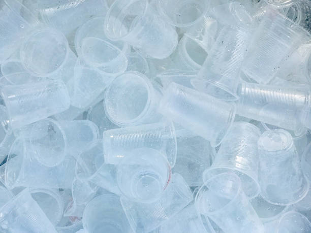istock Plastic cup in the trash, Plastic glass used for drinking water, waste plastic bottles, Recyclable garbage of plastic glass, 1182182565