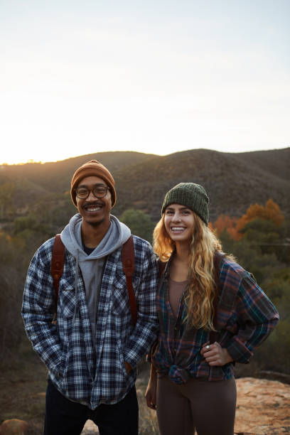 istock Smiling young couple enjoying a morning hike together 1182182686