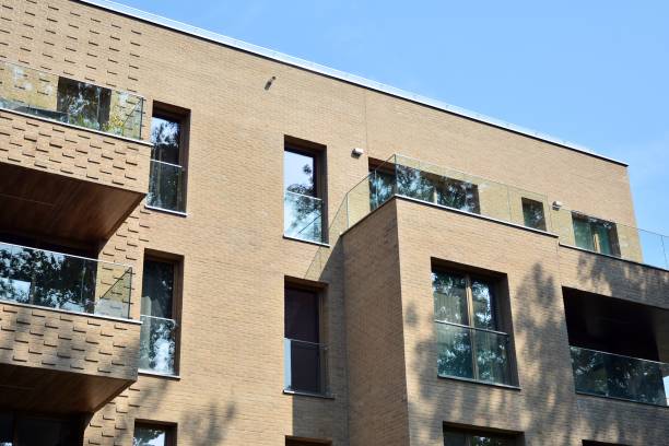 istock Modern apartment buildings on a sunny day with a blue sky. 1182185228