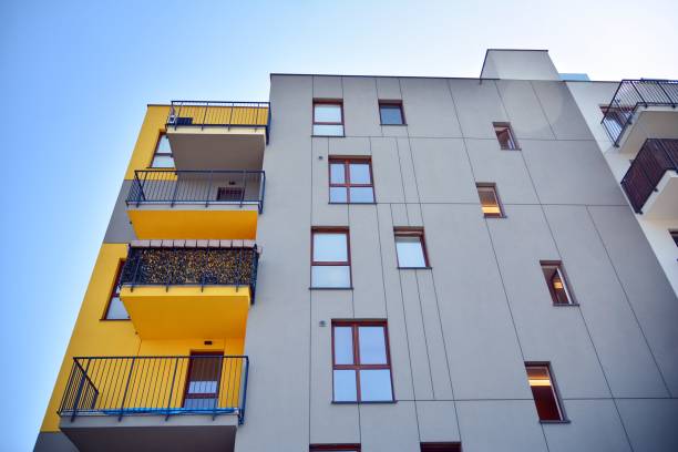 istock Modern apartment buildings on a sunny day with a blue sky. 1182185364