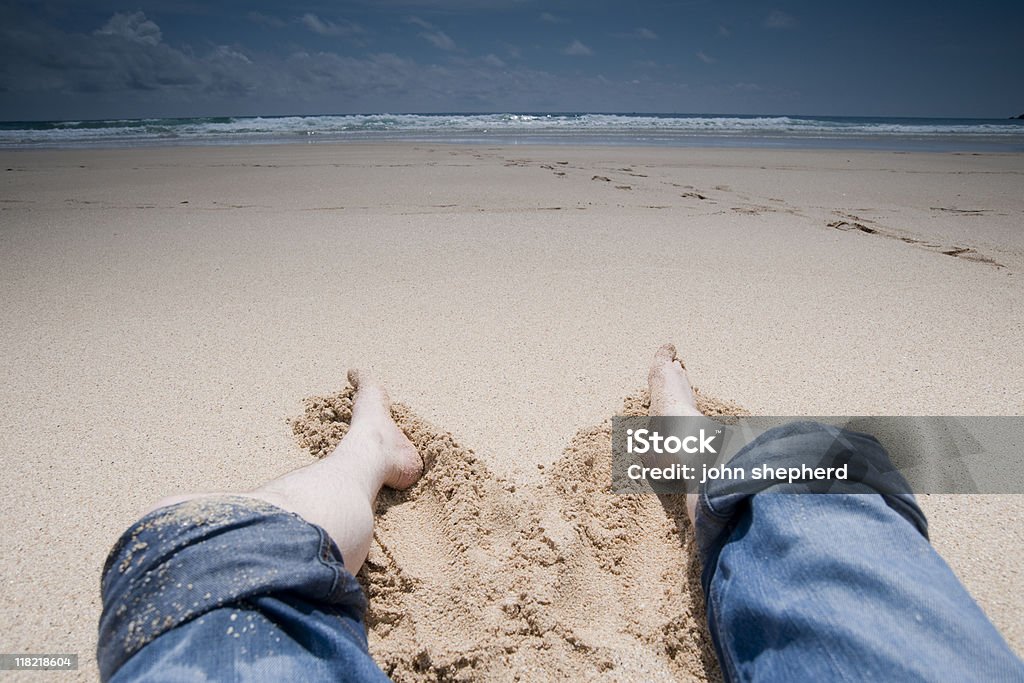 Les pieds dans le sable sur une plage parfaite. - Photo de Adulte libre de droits