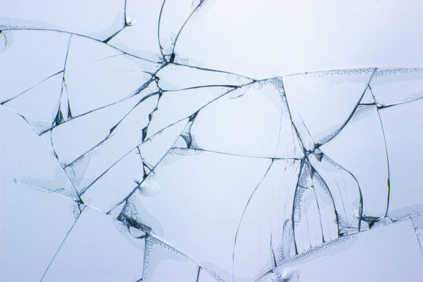 istock Broken glass background. Cracked glass. Shot in the window. 1182188653