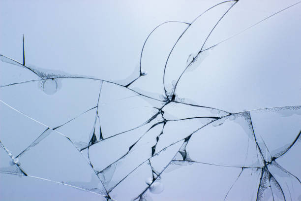 istock Broken glass background. Cracked glass. Shot in the window. 1182188664