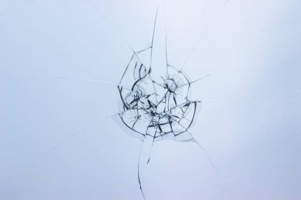 istock Broken glass background. Cracked glass. Shot in the window. 1182188677