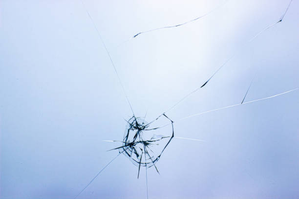 istock Broken glass background. Cracked glass. Shot in the window. 1182188681