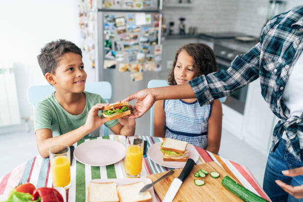 istock Modern family in the kitchen 1182191874
