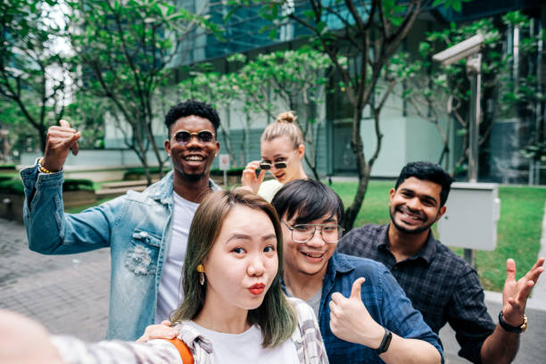 istock Group of Diversity People Taking Selfie Together 1182196441
