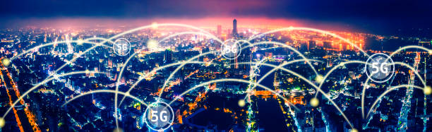 istock aerial view city at  night  and 5g network  tech concepts 1182197520