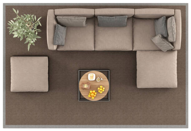 Top view of a modern sofa on carpet Top view of a modern sofa and coffee table on carpet, isolated on white background - 3d rendering carpet cushion stock pictures, royalty-free photos & images