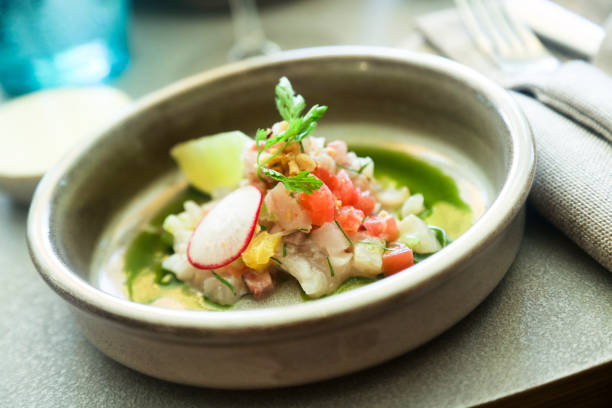 Ceviche White fish ceviche with fresh lime fresh cilantro stock pictures, royalty-free photos & images