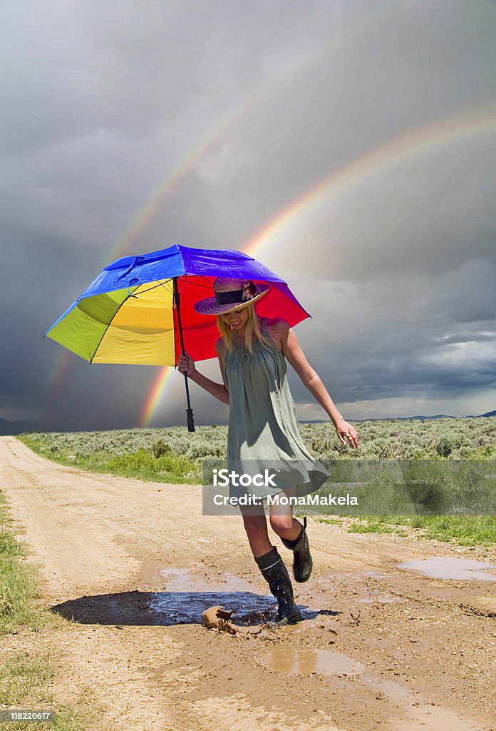 Girl and a rainbow  Splashing Stock Photo