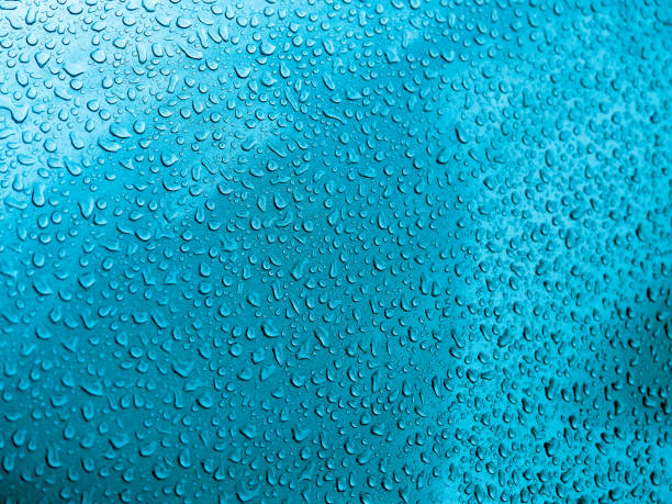 istock Water drops on glass. Rain droplets on glass background 1182207447