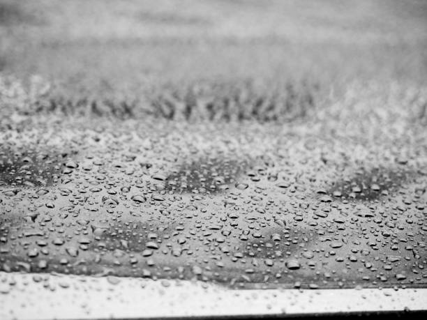 istock Water drops on glass. Rain droplets on glass background 1182207517
