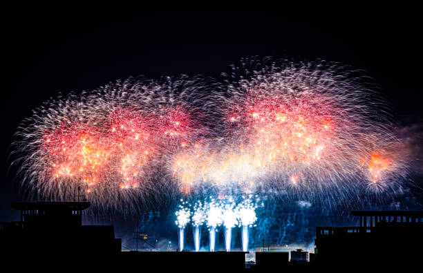istock Beautiful fireworks show on black background, new year fireworks 1182208309