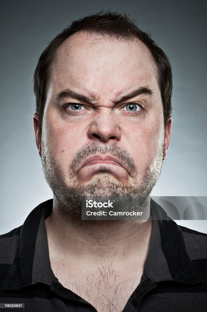 An unshaven man making a frown with eyebrows raised Man in his 30's expresses his discontent with a big frown and a blow of the cheeks. 

[url=http://www.istockphoto.com/file_search.php?action=file&lightboxID=12461798#1195d523][img]https://dl.dropbox.com/u/26734659/Specific%20Lightbox%20Links/people.jpg[/img][/url]
[url=http://www.istockphoto.com/file_search.php?action=file&lightboxID=6506072][img]https://dl.dropbox.com/u/26734659/Specific%20Lightbox%20Links/expressions.jpg[/img][/url] 30-39 Years Stock Photo