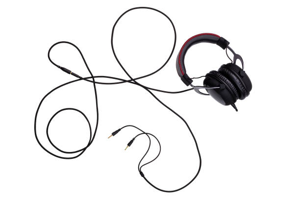 istock wired black gaming headset with whole wire isolated on white background in flat lay composition 1182209773