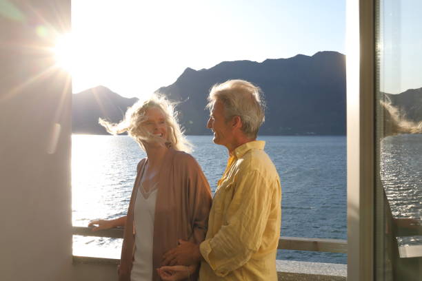istock terrace couple sunrise 1182210871