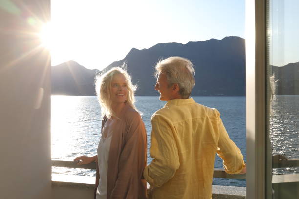 istock terrace couple sunrise 1182210929