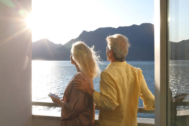 istock terrace couple sunrise 1182210955