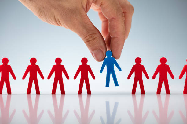 istock Hand Picking Ideal Job Candidate 1182211217
