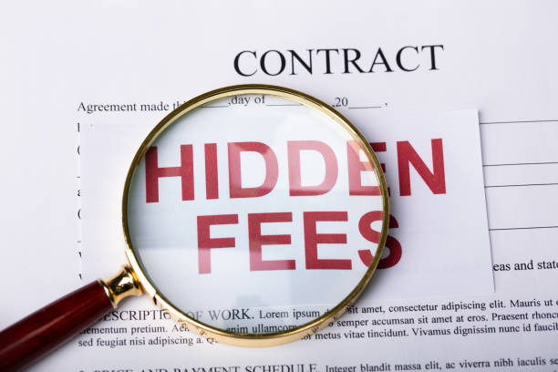 istock Magnifying Glass On Hidden Fees 1182211298