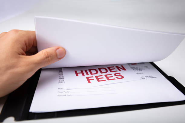 Person Looking At Hidden Fees In Contract Person Found Hidden Fees In His Contract hiding stock pictures, royalty-free photos & images