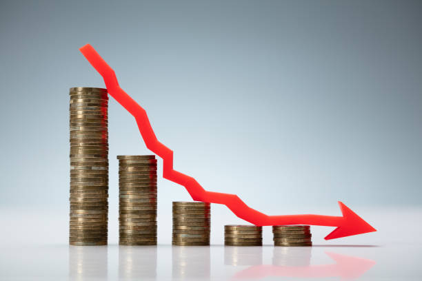istock Decreasing Graph Made Of Stacked Coins 1182211414