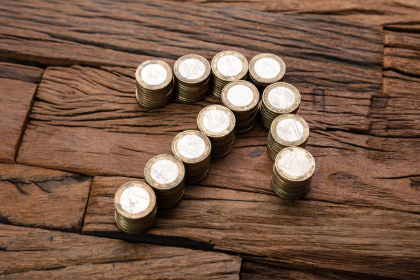 istock Stacked Coins Forming Arrow Sign 1182211455
