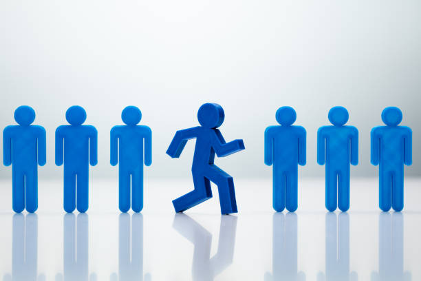 istock Go-Getter Running Man Standing Out From Line 1182212246