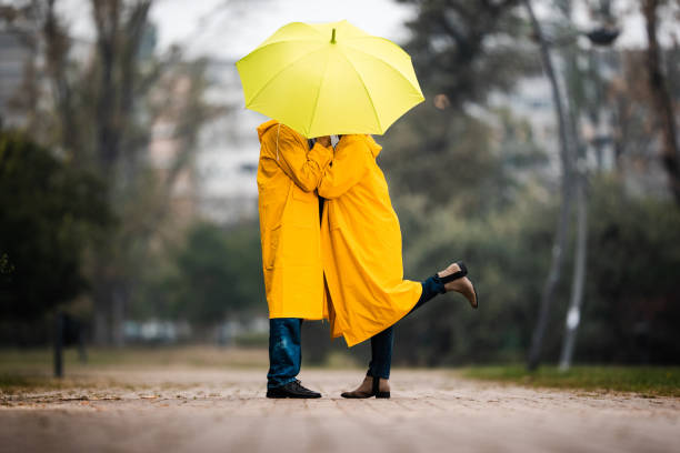 istock Kiss under the umbrella! 1182212721