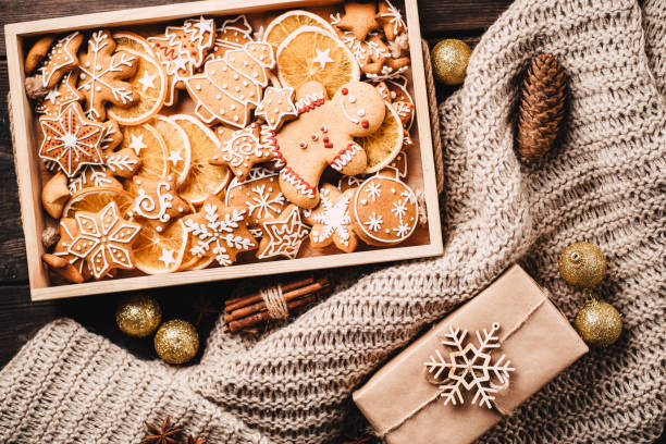 istock Christmas background with gingerbread and gifts 1182214908