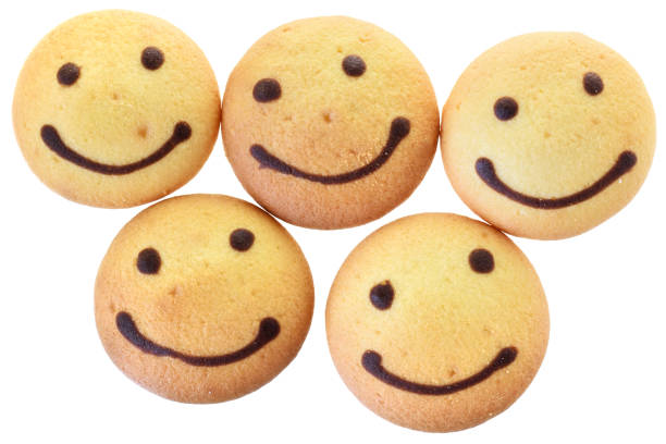 Sweet decorated sugar cookie depicting a smiling female senior adult face with glasses and white hair