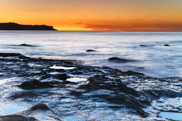 istock Clear Skies Sunrise Seascape 1182216228