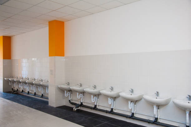 Toilet signs on ceramic tile wall