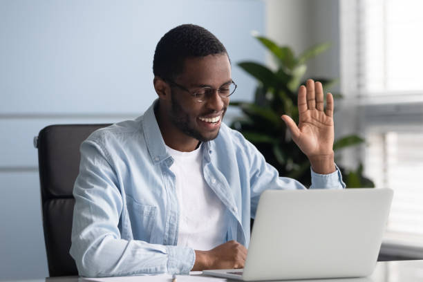 istock Happy african american worker greeting partners or clients. 1182227846