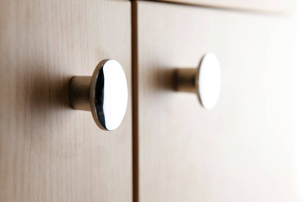 Cabinet door knob Close up of a cabinet door knob knob stock pictures, royalty-free photos & images