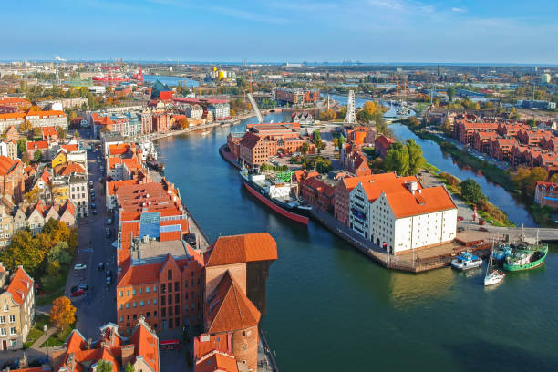 aerial view of the old town in gdansk with beautiful architecture - old crane blue sky imagens e fotografias de stock