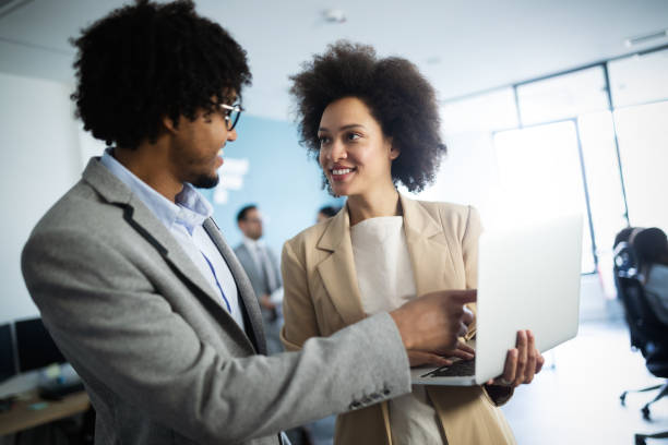 istock Successful business group of people at work in office 1182241774