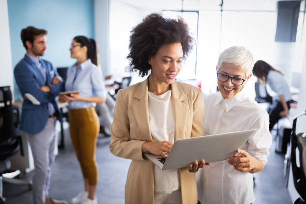 istock Successful business group of people at work in office 1182241794