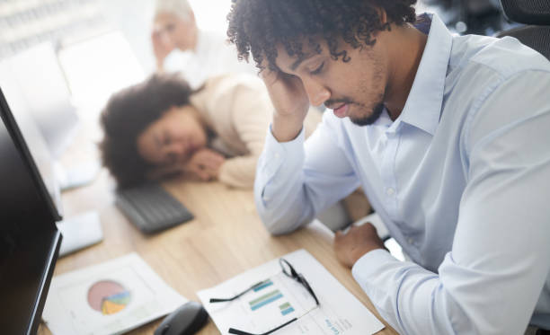 istock Business, people, fail concept - business people with laptop computer and papers working in office 1182242513