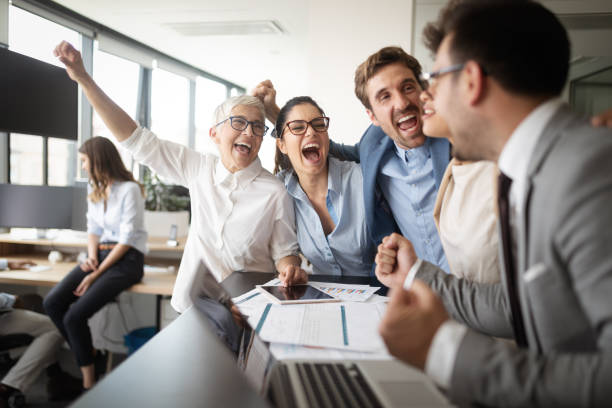 istock Successful business group of people at work in office 1182242676